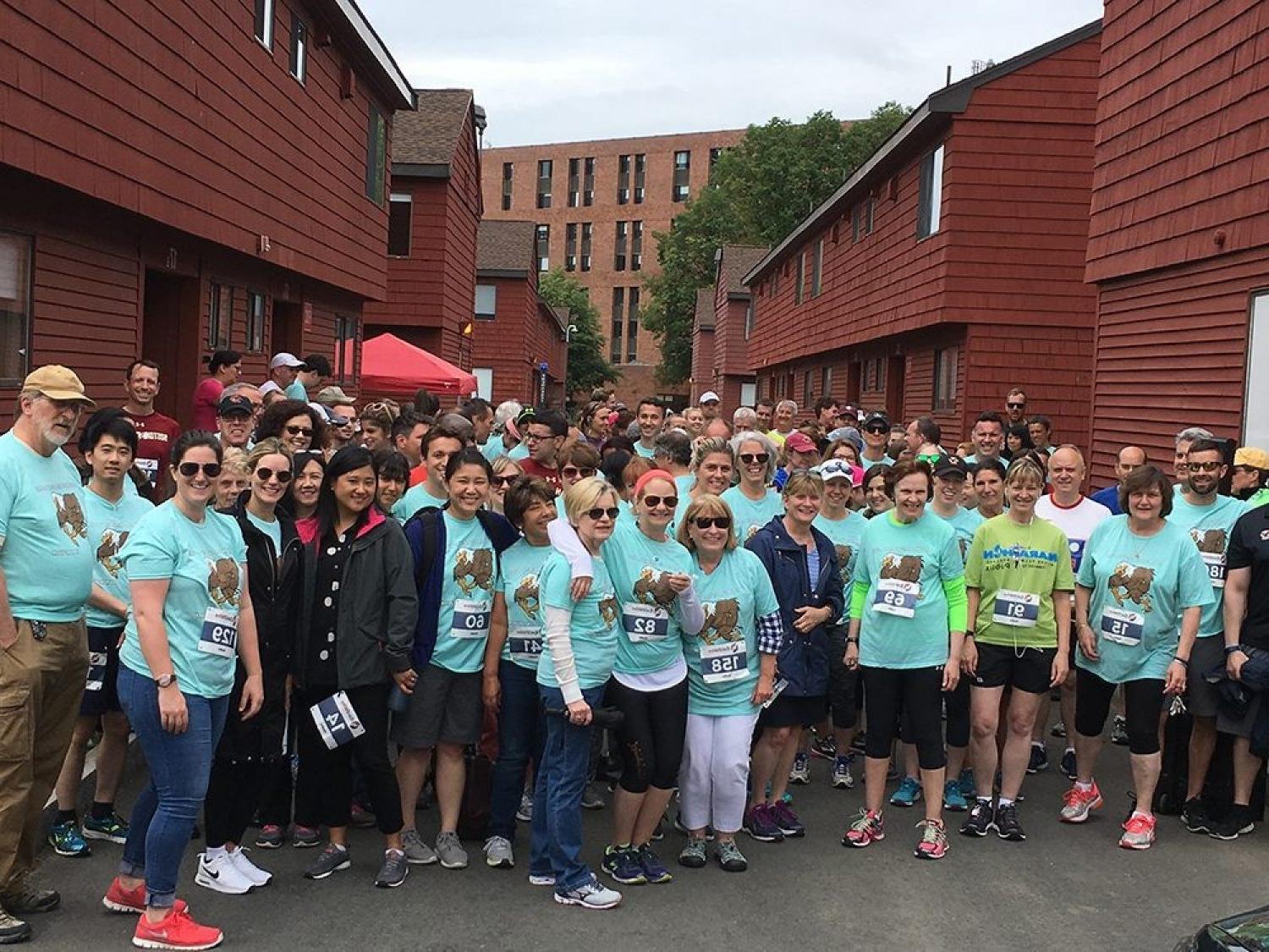 A group of people participating in a road race